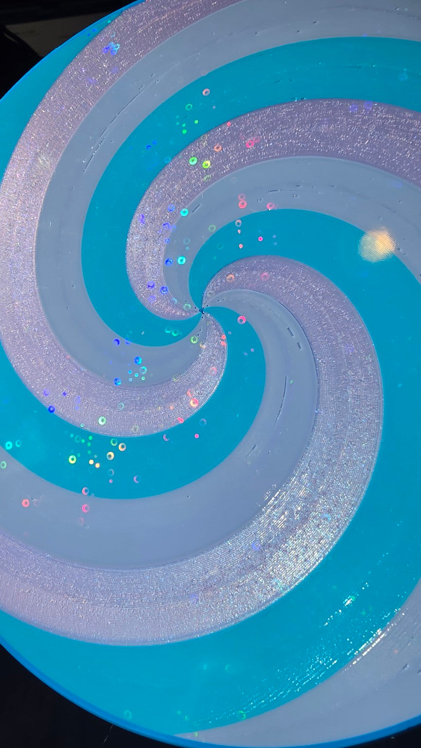 Close-up of swirl color test print texture